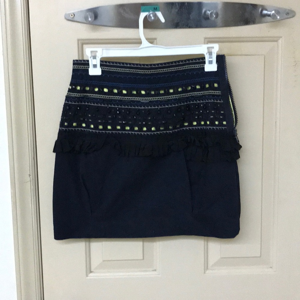Black skirt, yellow and black beading